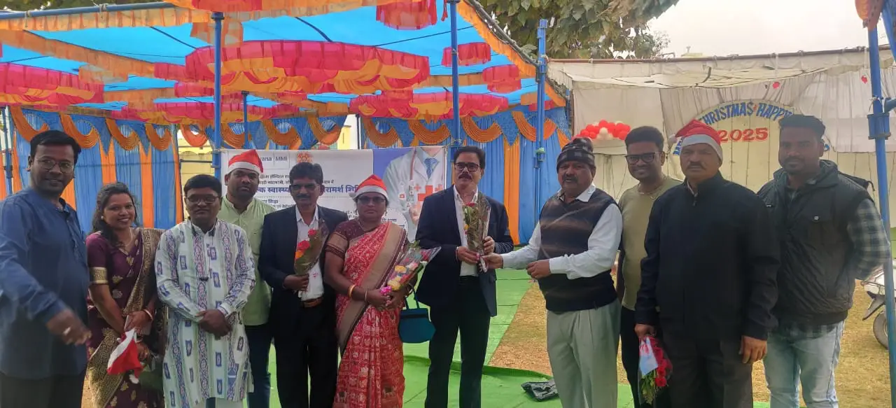 Dr. Rajesh Sinha being felicitated at Katabanji for a successful health camp organised by him